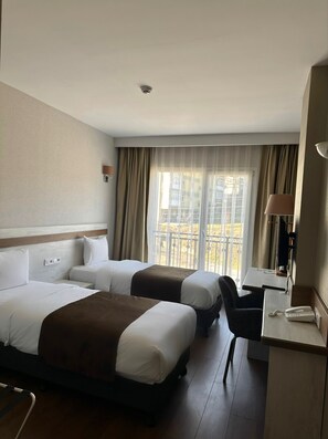 Standaard Twin kamer | Luxe beddengoed, een minibar, een kluis op de kamer