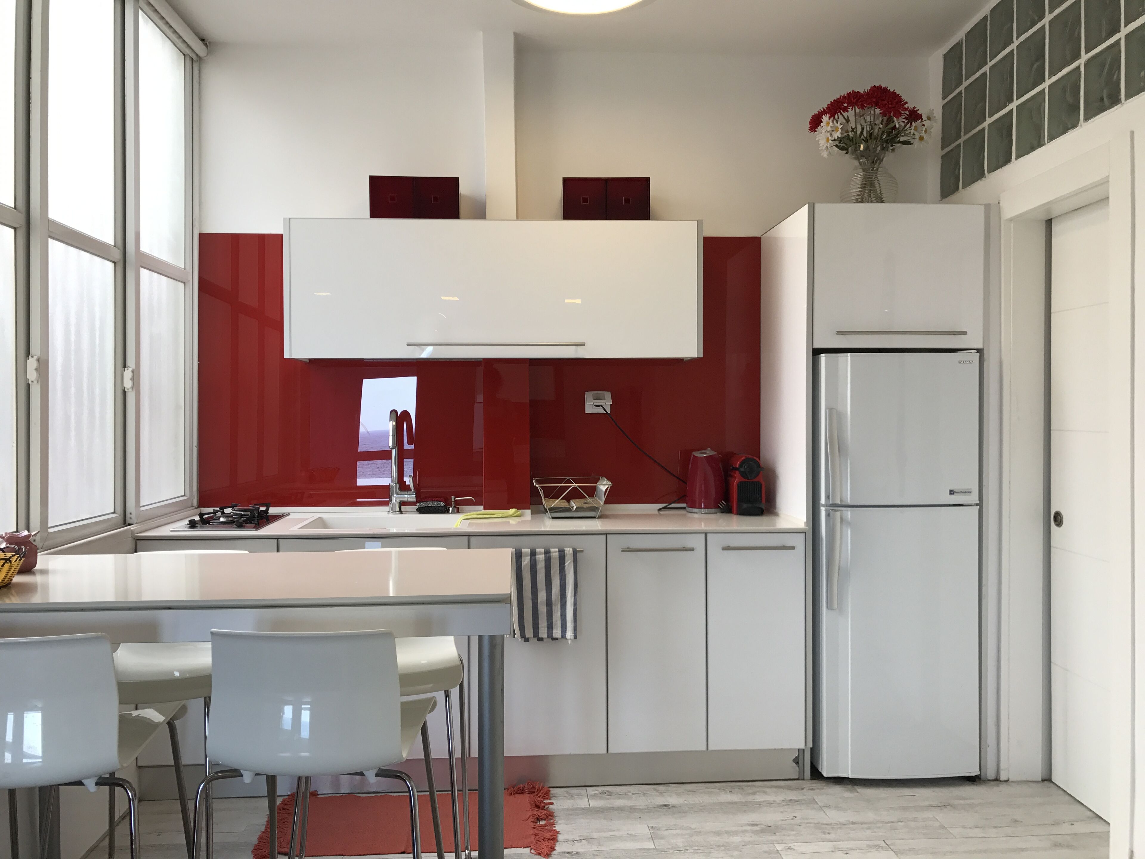 Fridge, microwave, stovetop, coffee/tea maker