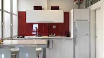 Fridge, microwave, stovetop, coffee/tea maker