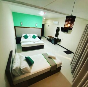 Deluxe-Dreibettzimmer, 1 Schlafzimmer | Schallisolierte Zimmer, kostenloses WLAN