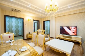 Appartement, 1 chambre | Salle de séjour | Télévision à écran plat