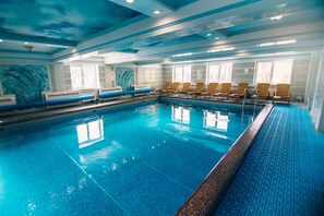 Indoor pool, seasonal outdoor pool, pool umbrellas, sun loungers