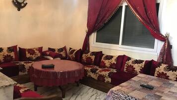 Apartment, 2 Bedrooms | Living area | Flat-screen TV