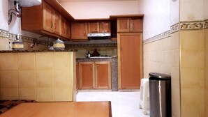 Apartment, 1 Bedroom | Private kitchen | Fridge, oven, stovetop, cookware/dishes/utensils