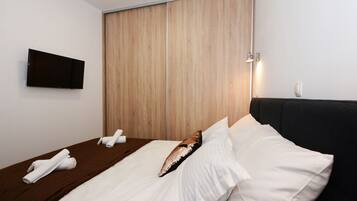 2 habitaciones, caja de seguridad en la habitación y escritorio