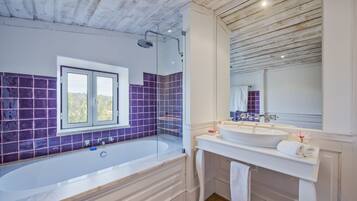 Combined shower/tub, hair dryer, towels, soap