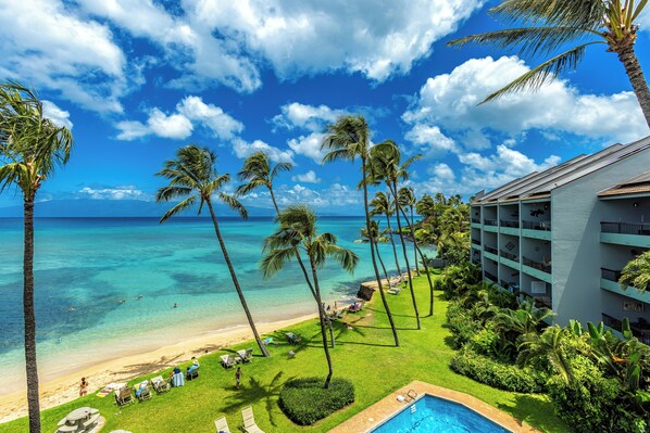 On the beach, sun-loungers, beach towels