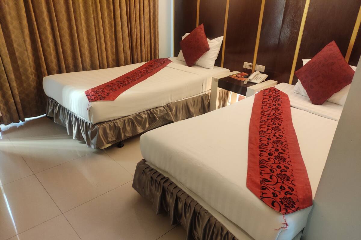 Habitación Deluxe con 1 cama doble o 2 individuales | Escritorio y wifi gratis