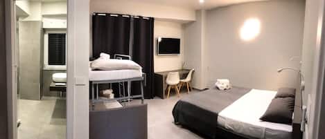 Deluxe Double Room | In-room safe, desk, laptop workspace, blackout drapes
