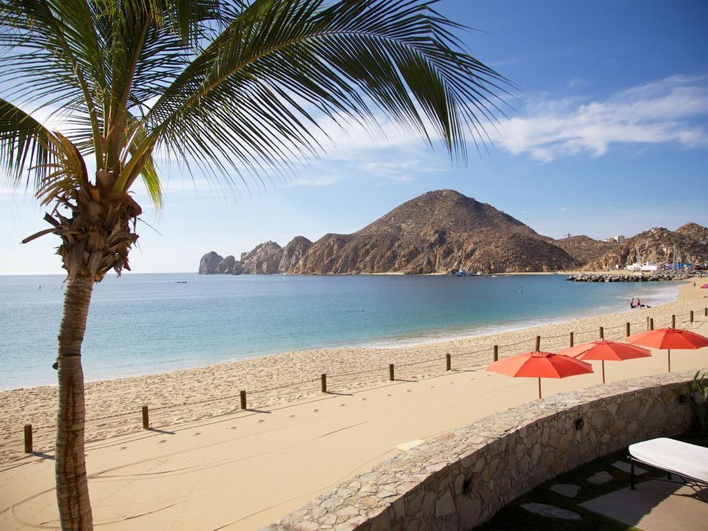 On the beach, sun-loungers, beach towels