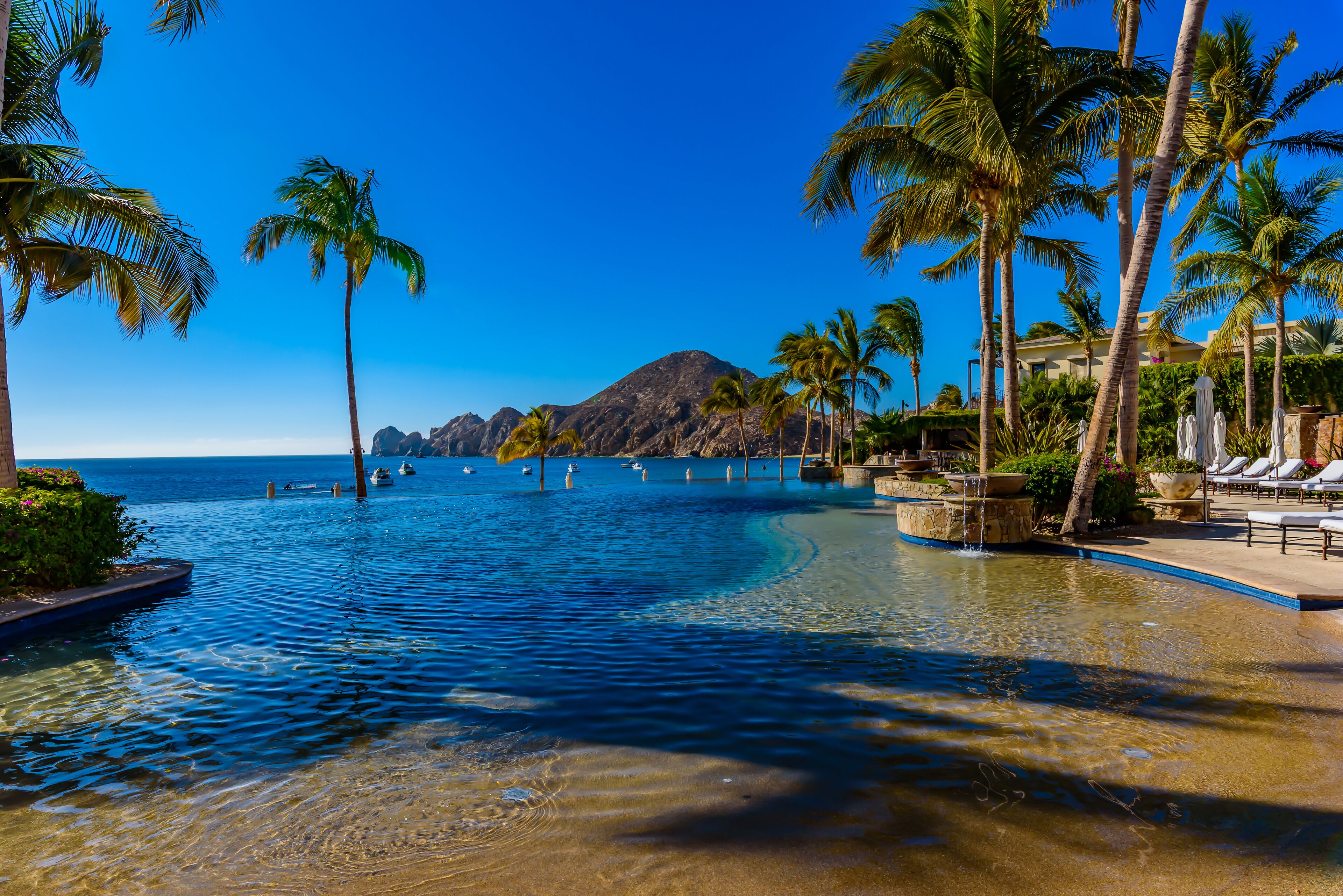 Hacienda's beautiful infinity pool overlooking Land's End and the Sea of Cortez 