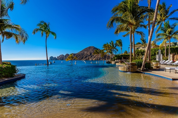 Hacienda's beautiful infinity pool overlooking Land's End and the Sea of Cortez