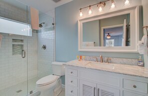 Combined shower/bathtub, hair dryer, towels, soap