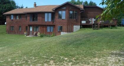 Beautiful 4 BDRM Retreat on Loon Lake with Sauna and Sand Beach!