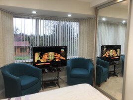 Quarto premium, 1 cama King | Individualmente decorados, individualmente mobiliados