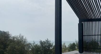 Un lit bien rangé prÚs de Haad Khao Takiab