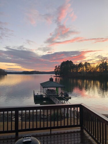 Lakefront home with private beach  & unbelievable sunsets on Lake Keowee