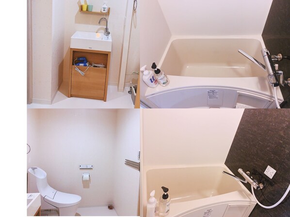 Et badeværelse med vask, toilet og badekar.