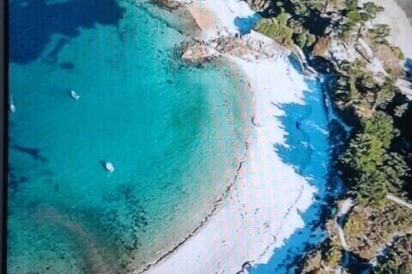 Na praia, espreguiçadeiras