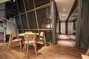 Family Apartment, Balcony | Living area | 43-inch flat-screen TV with cable channels - Mia Casa by Satori (Hanoi)