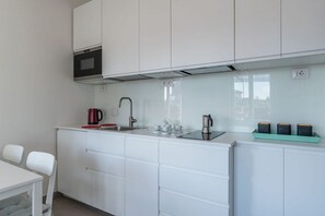 Fridge, microwave, stovetop, cookware/dishes/utensils - GuestHost - Fabulous penthouse located on the fifth floor of an ancient and characteristic building without a lift.In 85 square meters of space it comfortably accommodates 6 peopleExclusive penthouse with a panoramic view of the Eternal City, located in  (Roma)