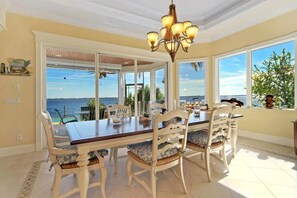 Enjoy meals with family and friends in this spacious dining area with a large table and six comfortable chairs.
