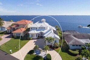 Situated on a well-maintained lawn, this property offers a driveway leading to its entrance.