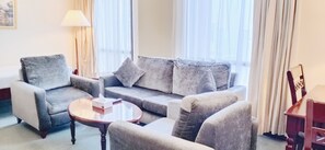 Family Junior Suite | Living area | 42-inch LED TV with cable channels, TV - Times Square Residence Suite KL (Kuala Lumpur)