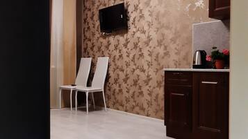 Comfort Studio | Bathroom | Bathtub, hair dryer, bathrobes, slippers