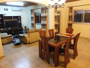 Comfort Apartment | Living room | Flat-screen TV - Makepe St Tropez Apartments - Orange Cam (Douala)