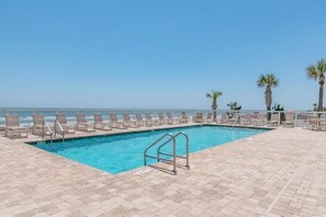Outdoor pool, a heated pool, pool loungers