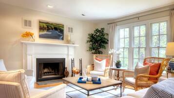 Smart TV, fireplace, table tennis, books