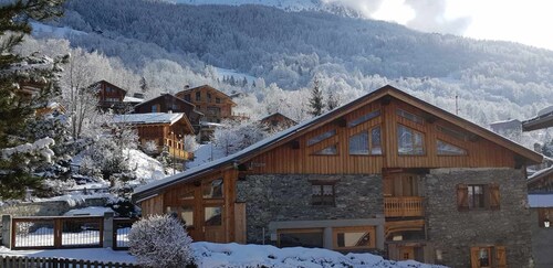 Appartement 3 étoiles, 9 couchages,  dans chalet authentique savoyard