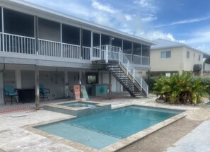 Outdoor pool, a heated pool - Marathon 3BR Canal Home w Pool Spa Combo 55' Dock Free pool heat and chiller (Marathon)