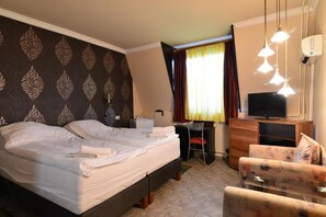 Premium bedding, pillow-top beds, in-room safe, individually decorated