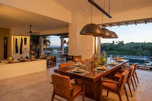 Central dining area comfortably seats eight