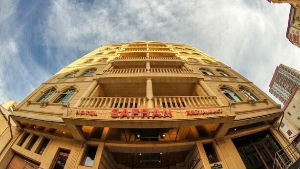 A hotel named "SAFRAN" with a prominent entrance, multiple balconies, and a classic architectural style. - Safran Hotel (Baku)