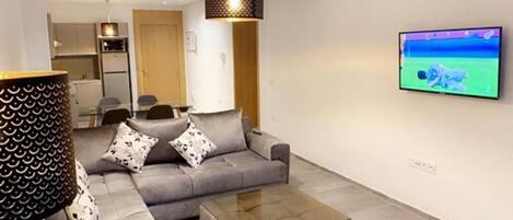Apartment, 2 Bedrooms | Living room | Flat-screen TV