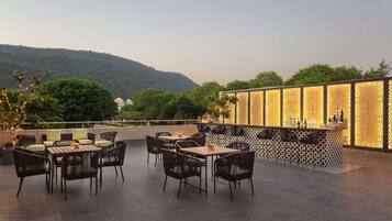 Rooftop bar, pool views, open daily