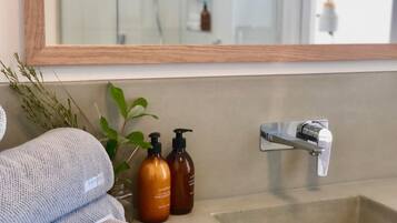 Hair dryer, towels, soap, shampoo