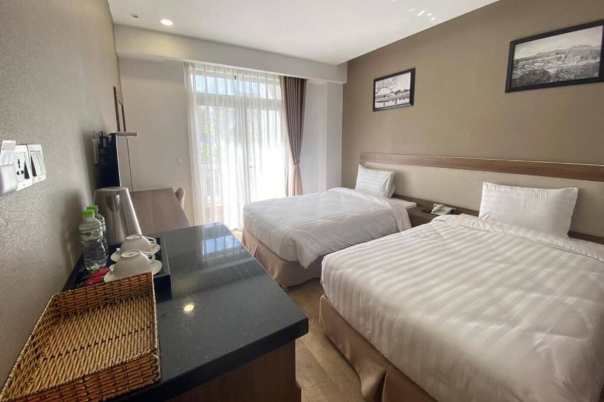 Chambre Deluxe | Minibar, coffre-fort, rideaux d’obscurcissement
