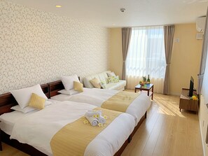 Twin Room (with Extra Bed) | In-room safe, desk, laptop workspace, blackout curtains - Ecot Shimozato 2 (Miyakojima)