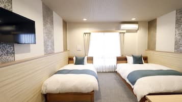コンフォート トリプルルーム | セーフティボックス (室内)、遮光カーテン、防音設備、WiFi (無料)