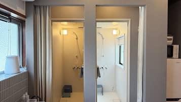 Separate bathtub and shower, free toiletries, hair dryer, slippers