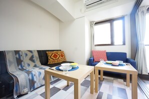 Apartment | Wohnbereich | Flachbildfernseher