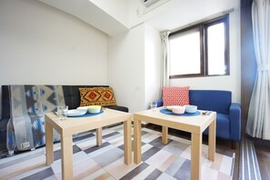 Apartment | Wohnbereich | Flachbildfernseher