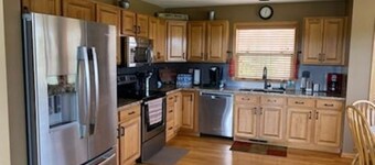 5 BR en suite with firepit, hot tub,and game room.