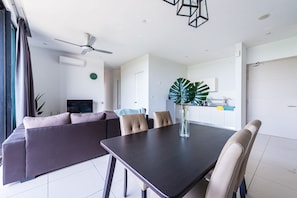 Deluxe Apartment, 2 Bedrooms | Living area | Flat-screen TV, Netflix, streaming services