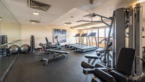 A gym with treadmills, weight machines, and exercise balls. - Dream City By Himmel (Seri Kembangan)