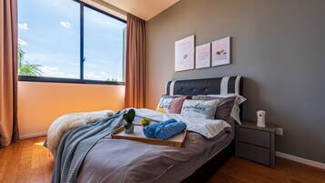 Apartamento Deluxe, 2 habitaciones | 2 dormitorios, cortinas opacas, tabla de planchar con plancha